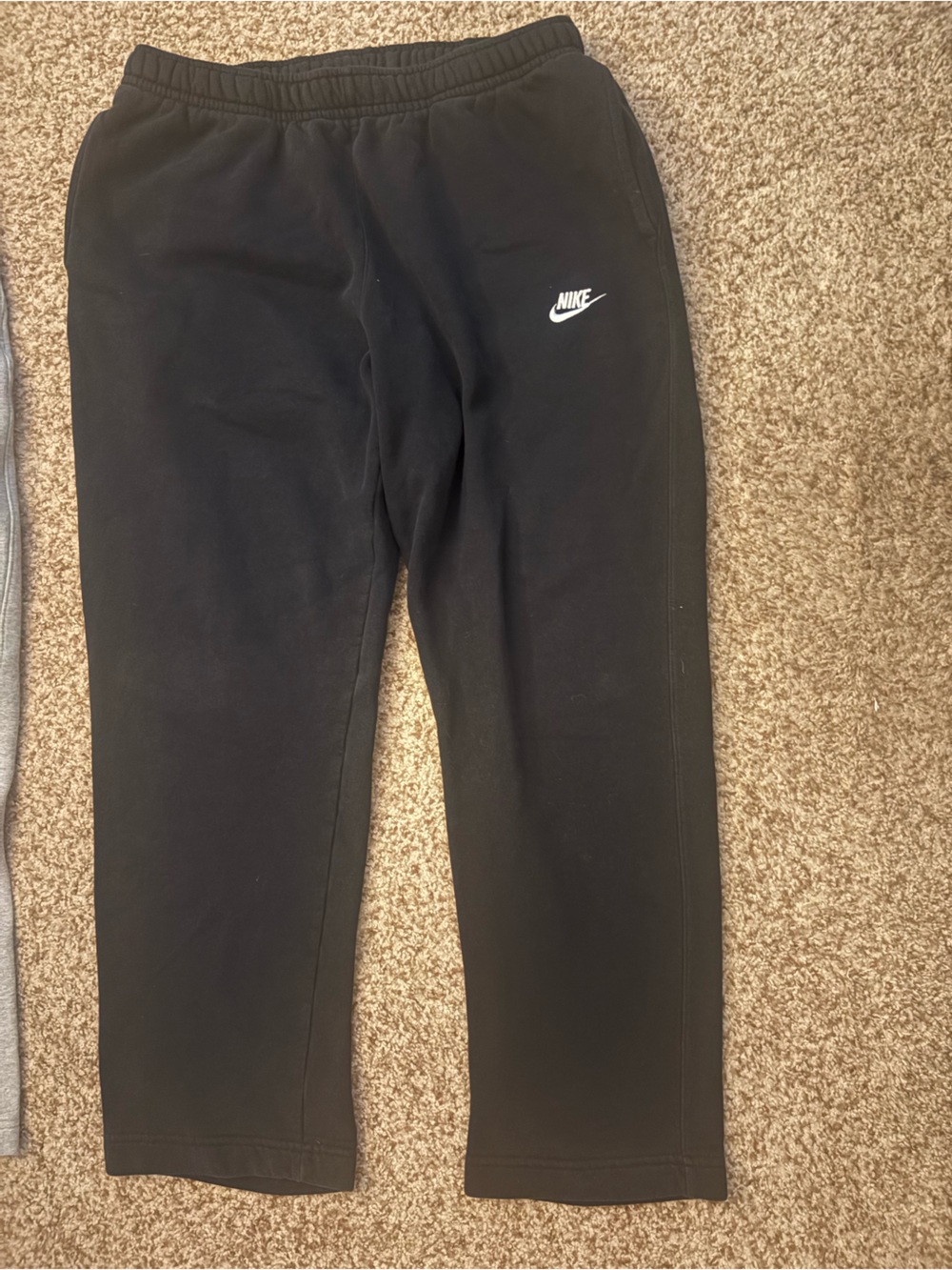Nike Black men’s Joggers with White Logo and open bottom